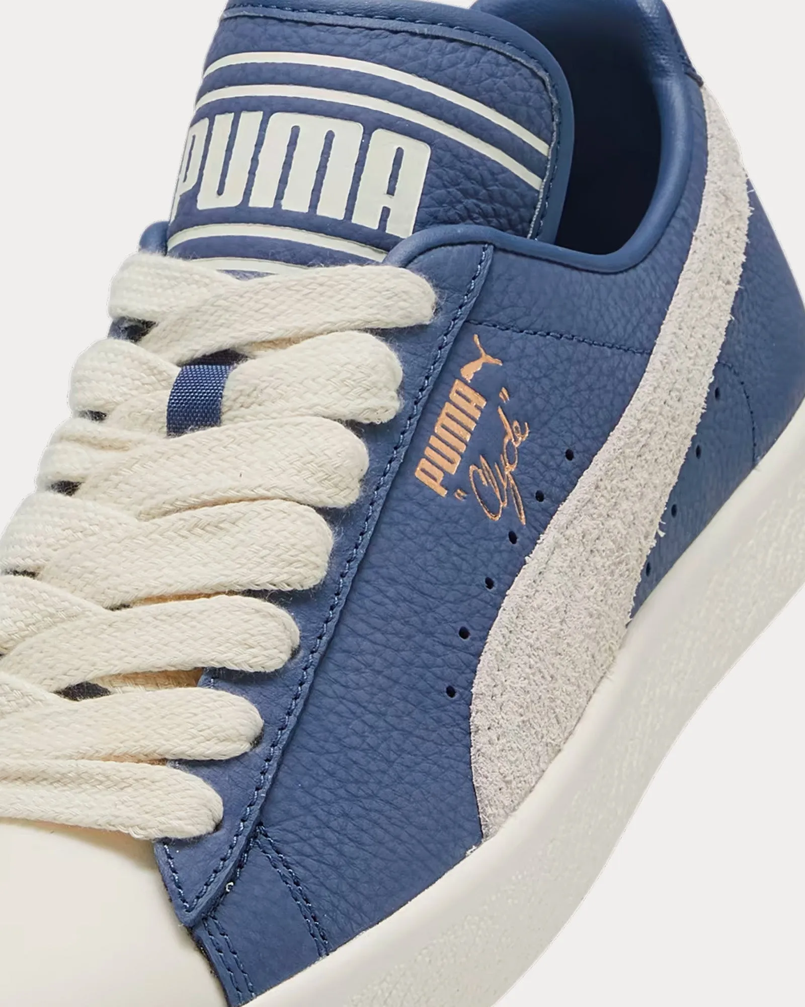 Clyde Pristine / Pristine / Inky Blue Low Top Sneakers